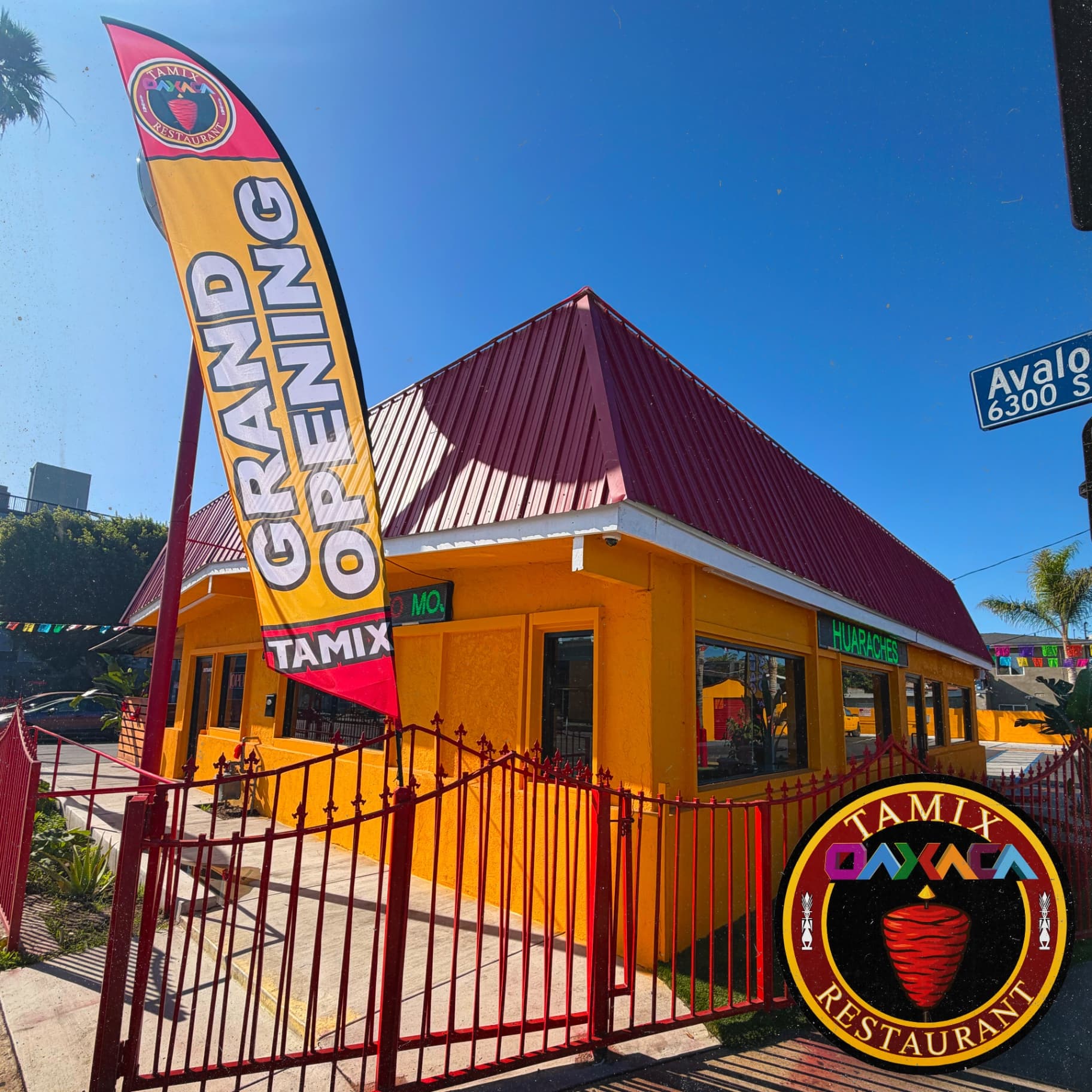 Tamix Oaxaca Restaurant grand opening celebration with authentic Mexican facade, orange walls, and traditional Oaxacan restaurant exterior in South Los Angeles